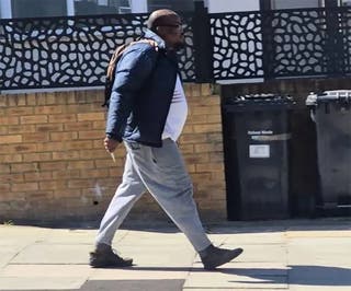 A picture of the suspect appears to show him carrying a knife